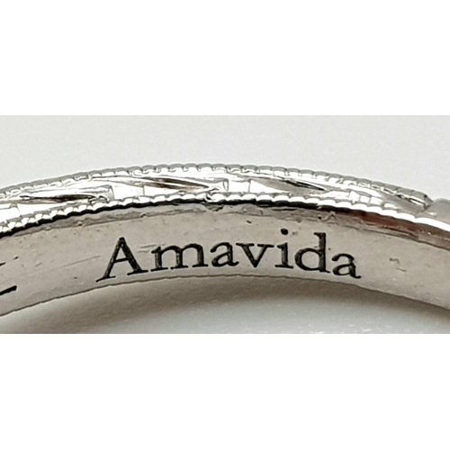 351 - A platinum diamond ring designed by AMAVIDA. Diamonds 0.82 carats, ring size: M/N, weight: 5.78 g.