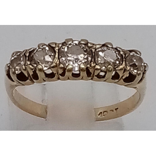 619 - An 18K Yellow Gold and Five Diamond Ring. Size N. 0.5ct
3.2g total weight.