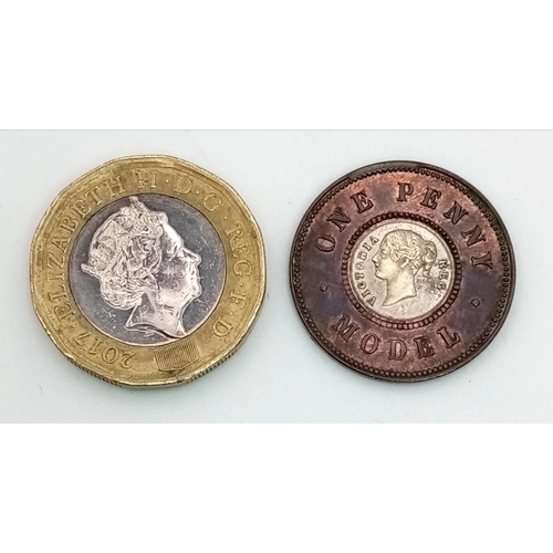 643 - A Queen Victoria Model One Penny Coin. Please see photos for condition.