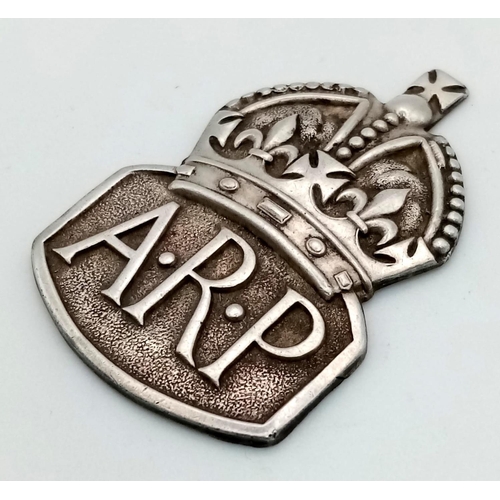 731 - A Vintage British Silver A.R.P. Badge. Back pin missing.
Hallmarks for London 1938.