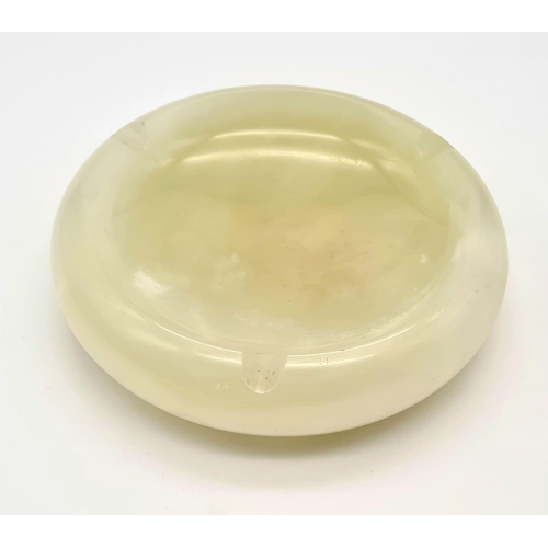 1194 - A Vintage Green Onyx Ashtray. 12cm diameter.