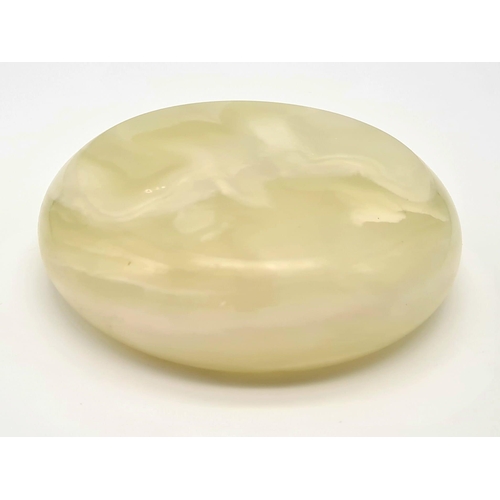 1194 - A Vintage Green Onyx Ashtray. 12cm diameter.