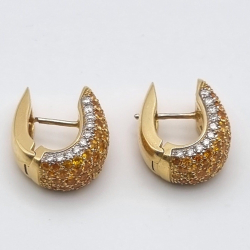 422 - A 19 K yellow gold pair of earrings with diamonds and citrine. Height: 20 cm, total weight: 17.35 g.