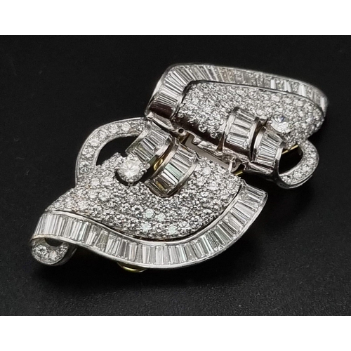 185 - A spectacular platinum  diamond double brooch. Baguette and brilliant cut quality diamonds (18.5 car... 