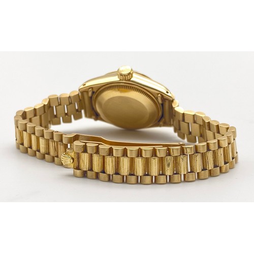 52 - A Rare Rolex Oyster Perpetual 18K Solid Gold Datejust Ladies Watch with Bark-Effect Decorative strap... 