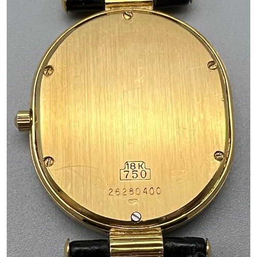 150 - An 18 K yellow gold ROBERGE gents watch. Oval dial (33 x 28 mm), blue face with diamonds on hour mar... 