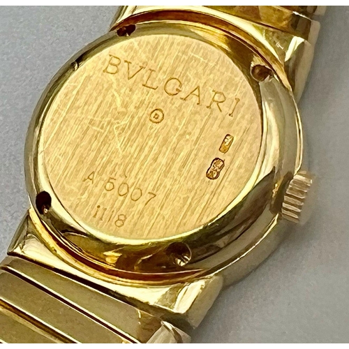 165 - An 18 K yellow gold BVLGARI ladies watch. 19 mm dial, gold face and gold bezel,  manual movement in ... 