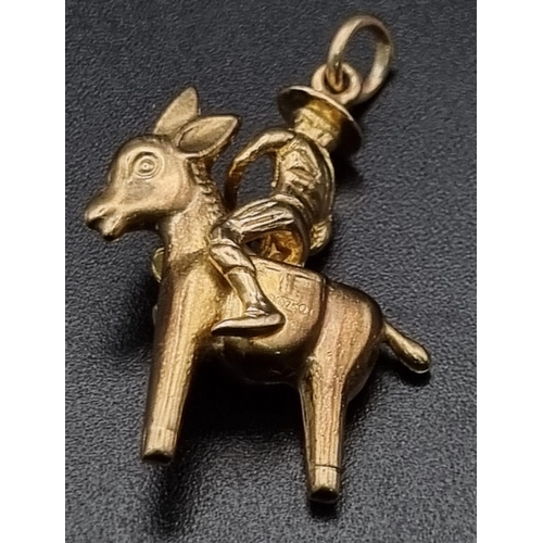 204 - A 9K Yellow Gold Asian Chap Carrying His Load on a Donkey Pendant or Charm. 3cm. 4.12g.