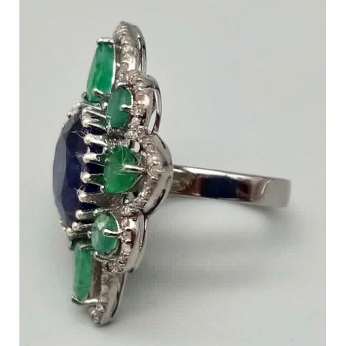 457 - 9.80cts Blue Sapphire Ring with 3.40cts Emeralds and 1.5cts Diamonds. Size M 1/2. 10.82 grams.