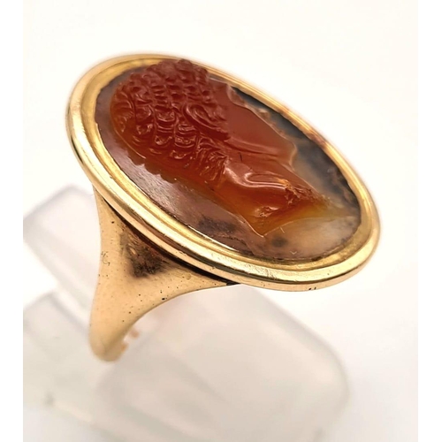 618 - An Ancient Possibly Later Roman Intaglio Signet Carnelian Seal Ring. Set in yellow metal. Size J 1/2... 