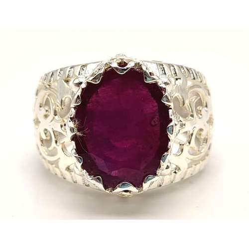 648 - 7.35cts Oval Cut Ruby Gemstone Ring in Vintage style, 925 Silver. 8.69 grams. Size: O 1/2