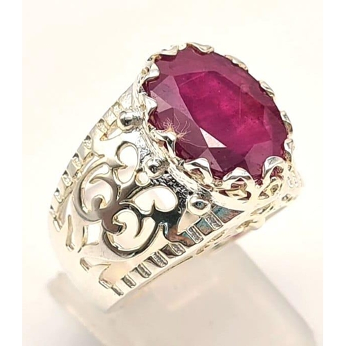 648 - 7.35cts Oval Cut Ruby Gemstone Ring in Vintage style, 925 Silver. 8.69 grams. Size: O 1/2