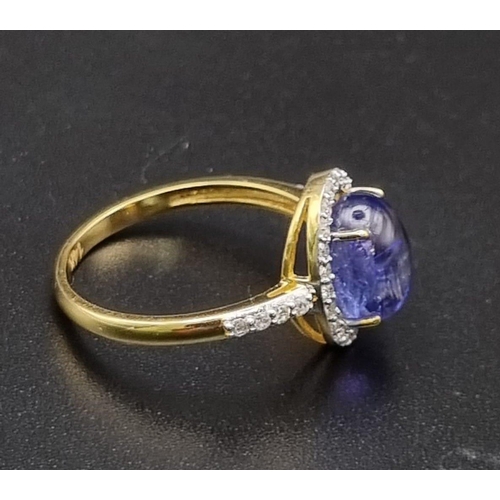 656 - 2.70cts Tanzanite Gemstone ring with .28cents diamonds in 14kt solid gold. 2.80 grams. Size: N 1/2. ... 