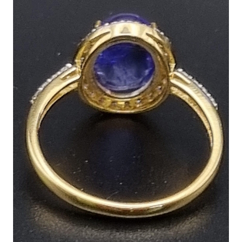 656 - 2.70cts Tanzanite Gemstone ring with .28cents diamonds in 14kt solid gold. 2.80 grams. Size: N 1/2. ... 