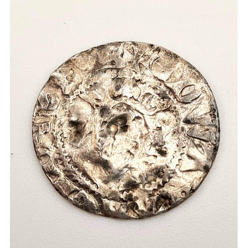 715 - An Edward I Silver Hammered Penny Coin. 1293-1307. London mint. Near fine condition but please see p... 