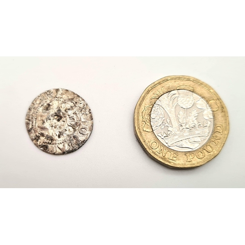 715 - An Edward I Silver Hammered Penny Coin. 1293-1307. London mint. Near fine condition but please see p... 