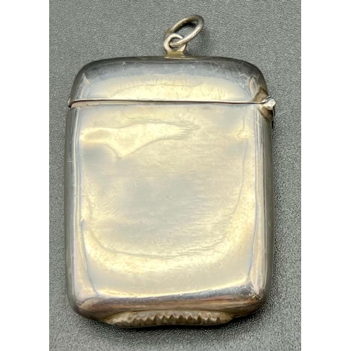 723 - An Antique Golf-Themed Sterling Silver Vesta Case.