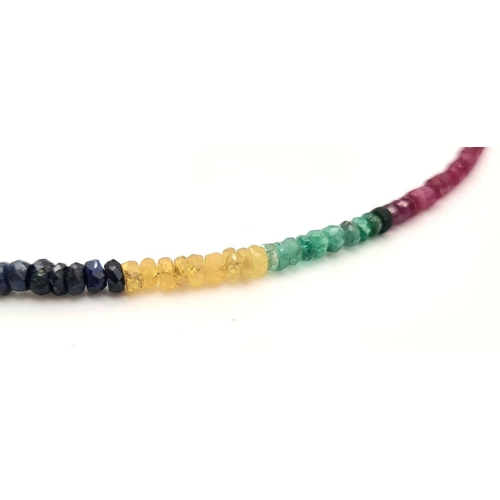 645 - An Emerald, Sapphire and Ruby Bead Necklace. 40cm.