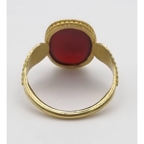 250 - An Ancient Greek Possibly Roman 22K Gold Intaglio Carnelian Agate Ring. Size O. 3.81g total weight.