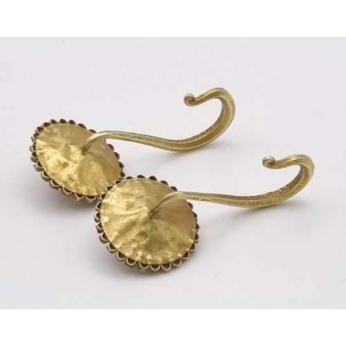 257 - An Ancient Greek Possibly Roman Pair of 22K Gold Wheel Earrings. Both with a swan-hook drop. 2cm dia... 