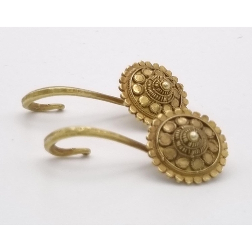 257 - An Ancient Greek Possibly Roman Pair of 22K Gold Wheel Earrings. Both with a swan-hook drop. 2cm dia... 