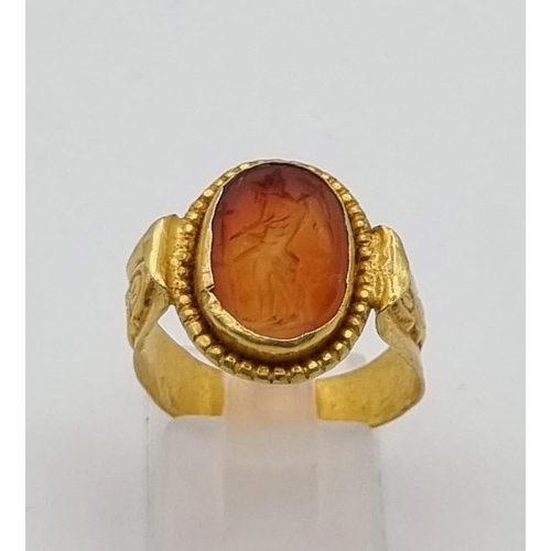 264 - An Ancient Greek Possibly Roman Intaglio Carnelian Agate Ring. Size P. 3.4g total weight.