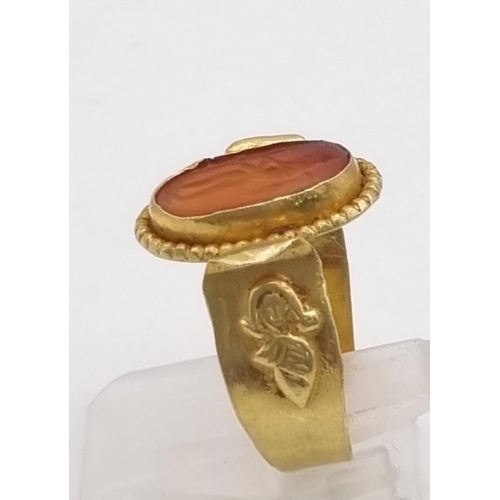 264 - An Ancient Greek Possibly Roman Intaglio Carnelian Agate Ring. Size P. 3.4g total weight.