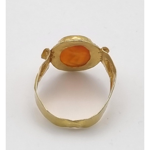 264 - An Ancient Greek Possibly Roman Intaglio Carnelian Agate Ring. Size P. 3.4g total weight.