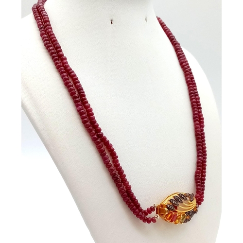 144 - Vintage Double strand Ruby Necklace, with Multi-coloured Sapphires & Rose cut diamonds on the clasp.... 