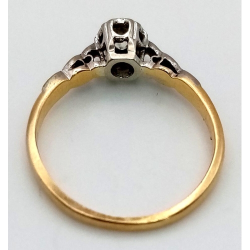 582 - An 18K Yellow Gold, Platinum and Diamond Solitaire Ring. 0.25ct diamond. Size L. 2.04g total weight.