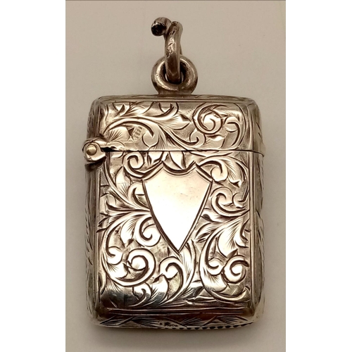 277 - An Antique Silver Vesta Case. Hallmarks for Birmingham.
2.5 x 4cm.