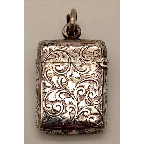 277 - An Antique Silver Vesta Case. Hallmarks for Birmingham.
2.5 x 4cm.