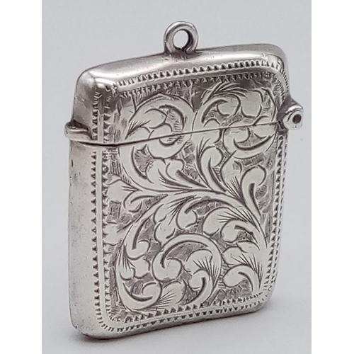 393 - An Antique Silver Vesta Case. Hallmarks for Birmingham. 
4 x 3cm.