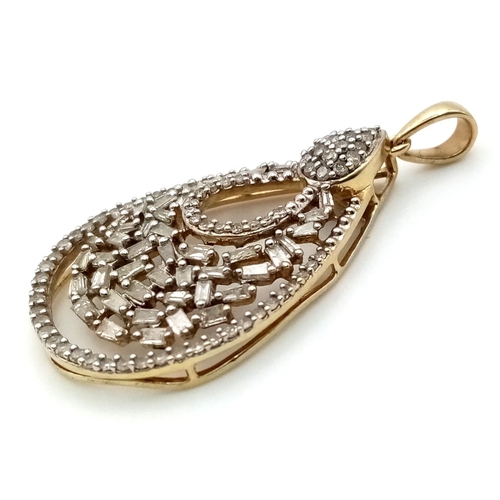 306 - 9K YELLOW GOLD DIAMOND FANCY PENDANT. 3.4G. 1CT APPROX