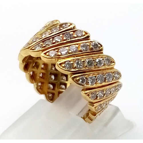 224 - An 18K Yellow Gold Custom-Made Diamond Ring. 4ct of top quality diagonally laid diamonds give this r... 