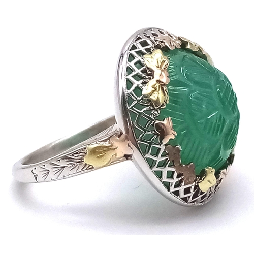 547 - An Interesting 14K White and Yellow Gold Natural Emerald Ring. Hand-carved decoration. 15ct. Size J.... 