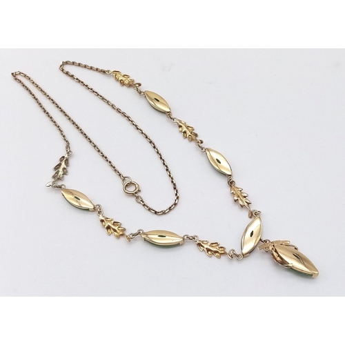 470 - A 14K yellow Gold Jade Oval Cabochon Necklace. A belcher link necklace decorated with five jade cabo... 