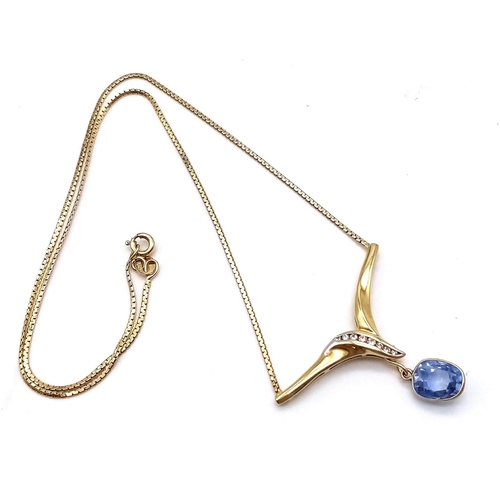 442 - An Elegant 18K Yellow Gold Sapphire and Diamond Necklace. A delicate gold necklace with chevron and ... 