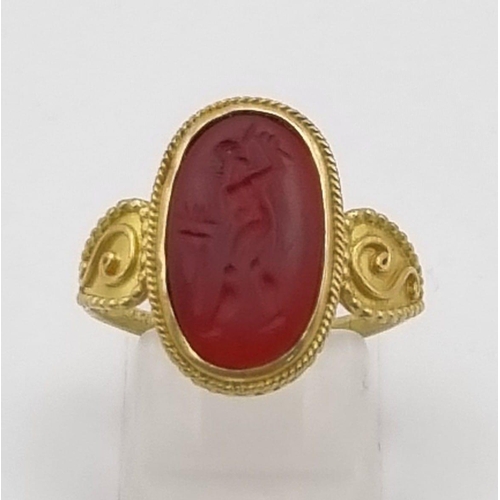 173 - An Ancient Greek Possibly Roman 22K Gold Intaglio Carnelian Agate Ring. Size O. 3.81g total weight.