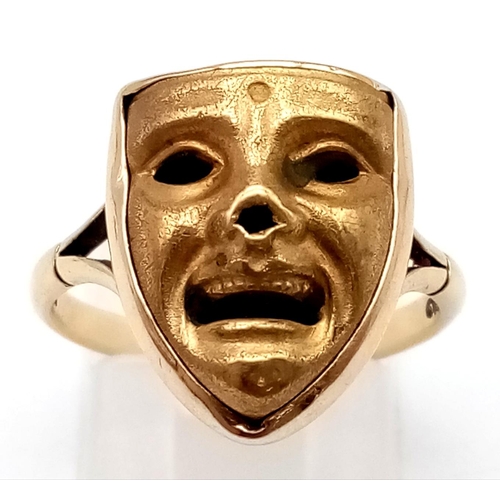 148 - 9K YELLOW GOLD COMEDY/TRAGEDY FACE SYMBOL RING. SIZE M. 2.9G