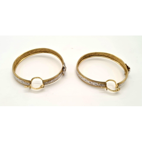 151 - A Pair of 14K Yellow and White Gold Geometric Decorative Hoop Earrings. Lever back clasp. 6.6g total... 