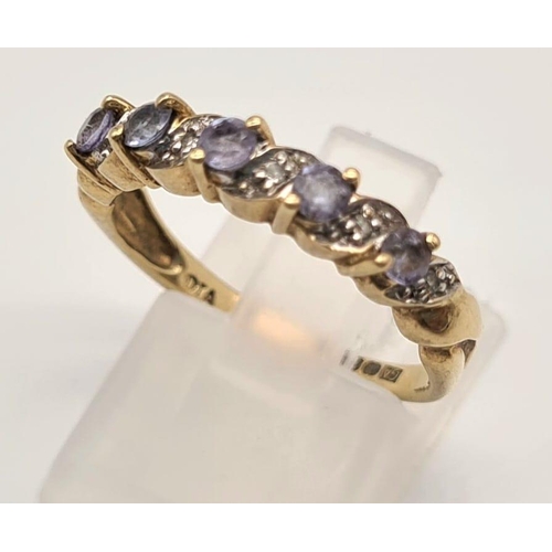 185 - 9K YELLOW GOLD DIAMOND & IOLITE BAND RING. 2.2G SIZE O