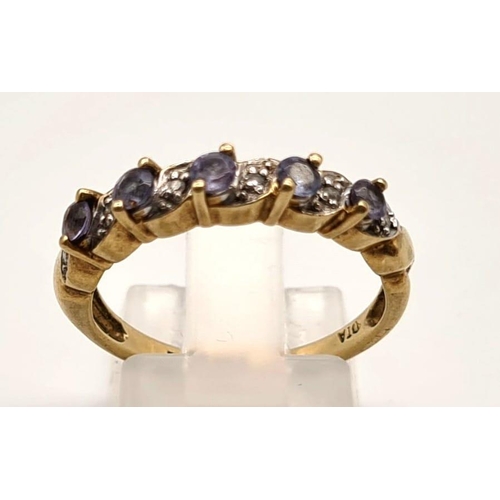 185 - 9K YELLOW GOLD DIAMOND & IOLITE BAND RING. 2.2G SIZE O