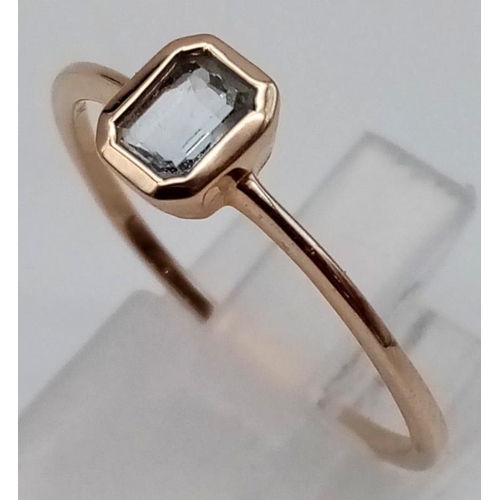 352 - 9K YELLOW GOLD AQUAMARINE RING. 1.4G SIZE U