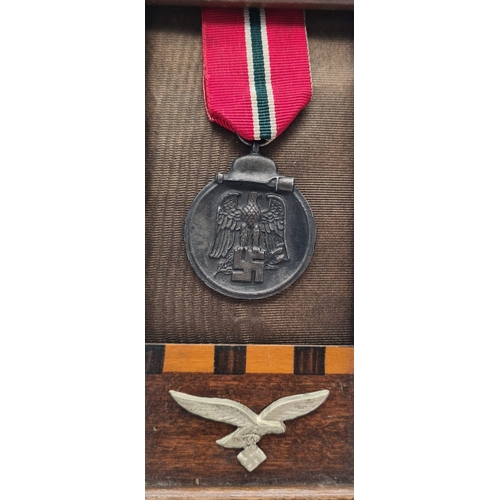 433 - WW2 German Eastern Front Medal and Luftwaffe Eagle in Frame. No Glass.