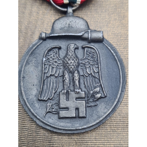 433 - WW2 German Eastern Front Medal and Luftwaffe Eagle in Frame. No Glass.