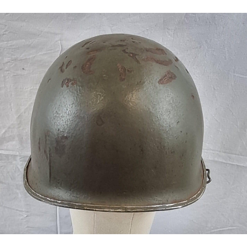 133 - WW2 US M1 Swivel Bale Helmet Front Seam Helmet with insignia of the 27th Infantry Division.