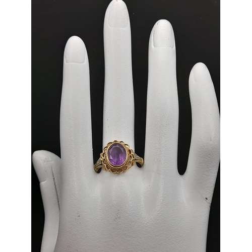 530 - 9K YELLOW GOLD AMETHYST RING 3.1G SIZE V