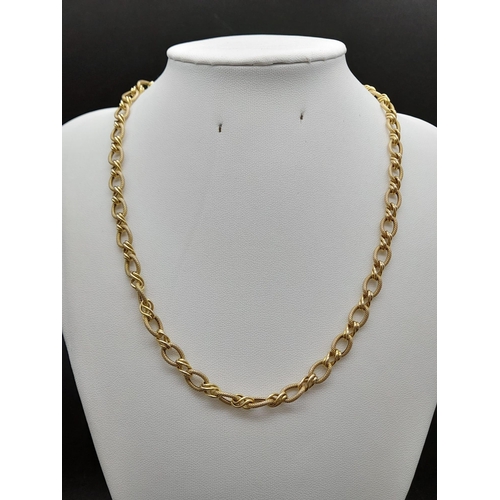 58 - A Sophisticated 14K Yellow Gold Oval and Twisted Link Chain. 86cm long. 12.7g. Lobster clasp. Ref - ... 