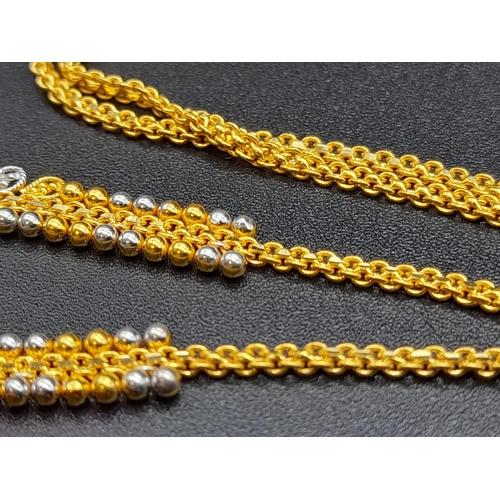 65 - A Glamourous 22k Yellow and White Gold Asian Design Necklace with Hanging Shell Pendant. 3 and 40cm.... 